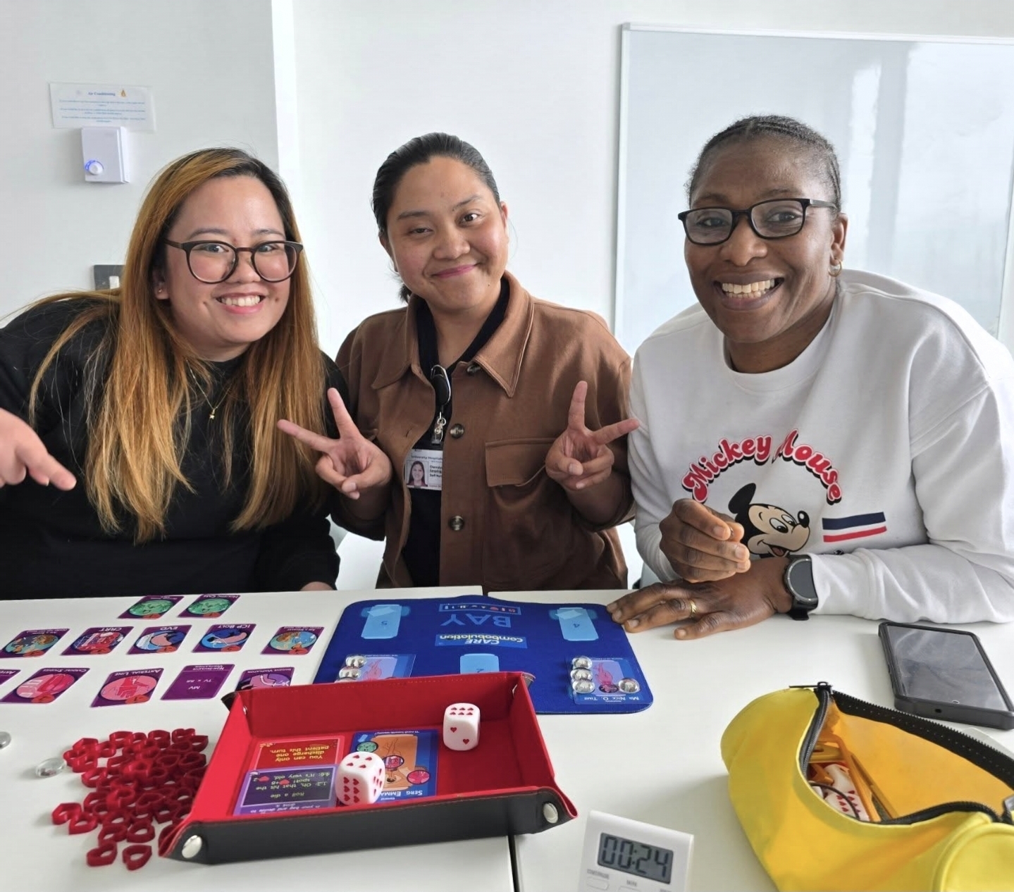 Healthcare professionals playing CareCombobulation board game